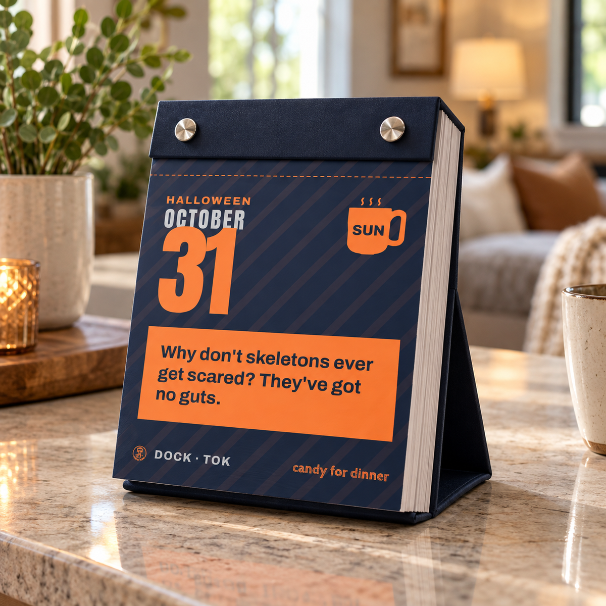 DockTok Daily Dad Joke Calendar 2027 open to an inside page with an orange design