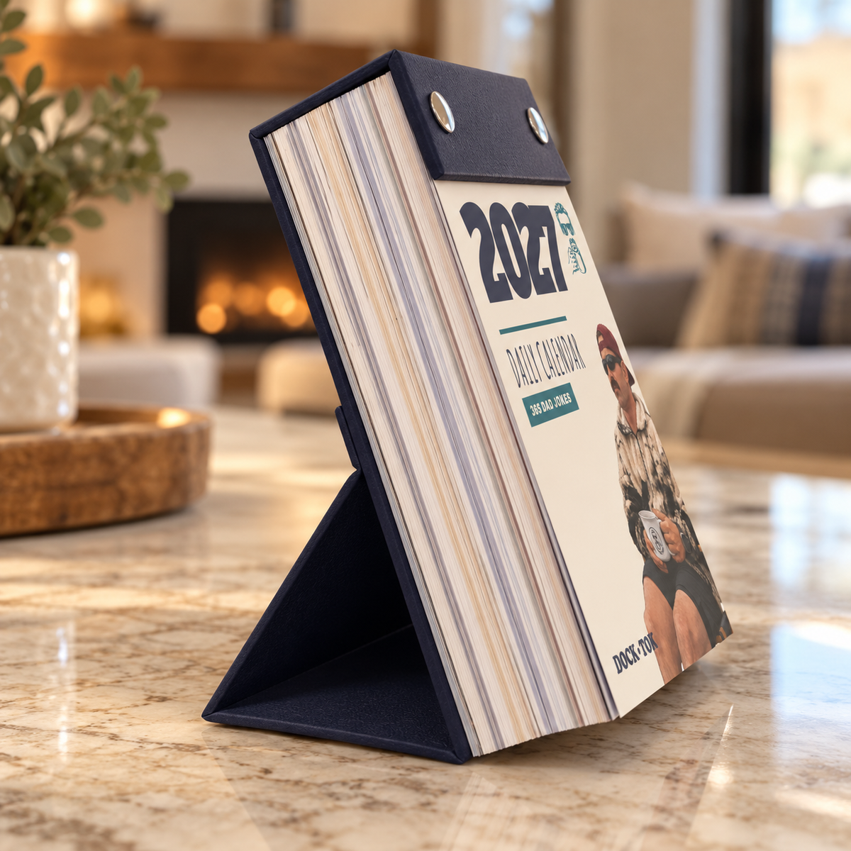 Side view of the DockTok Daily Dad Joke Calendar 2027 standing on a desk